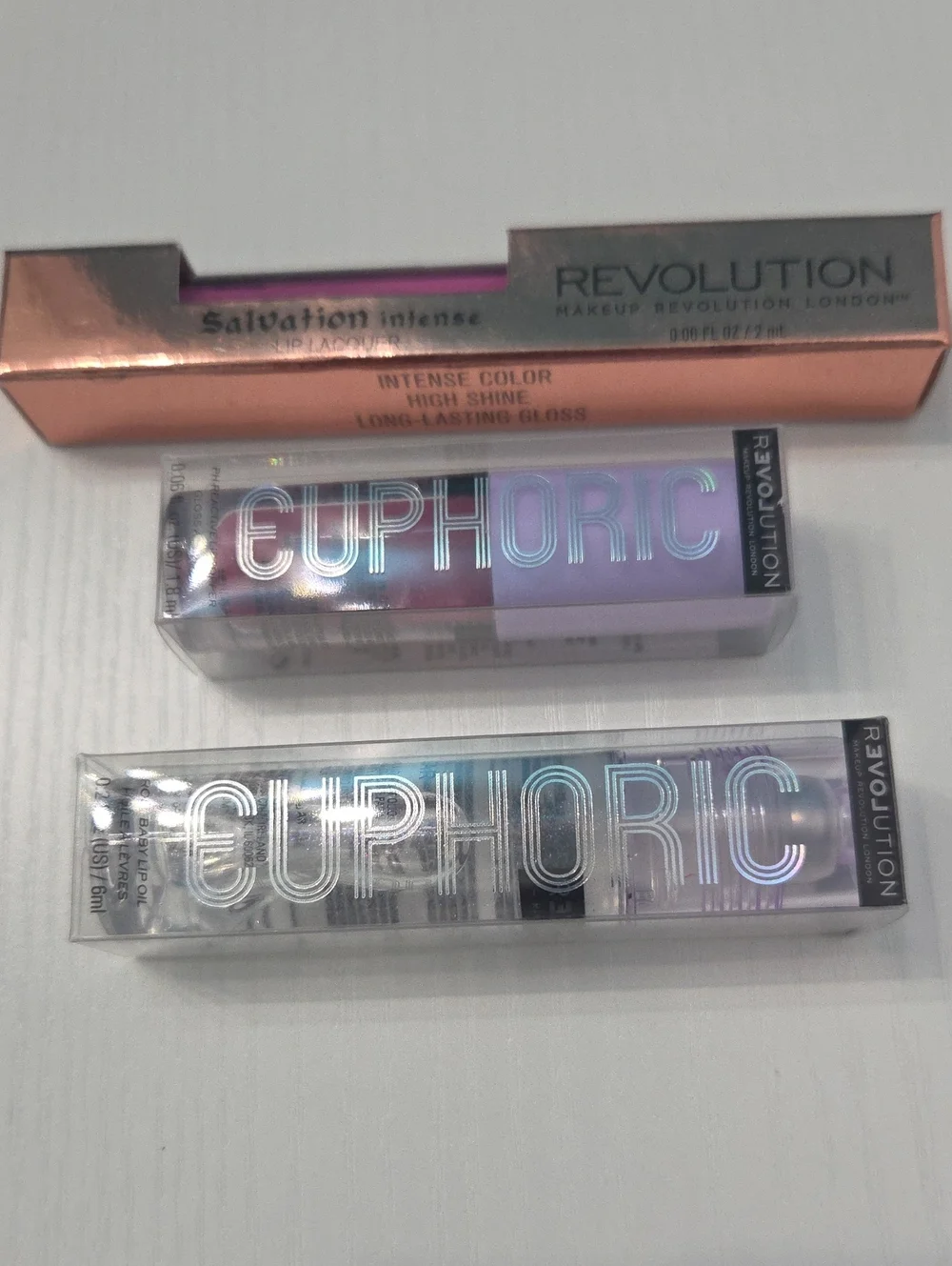 Revolution Lip Gloss Trio in Metallic Rose Gold & Holographic Silver
